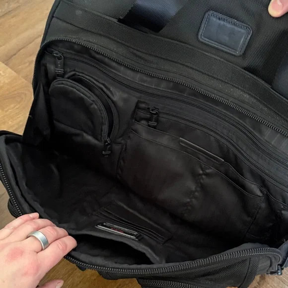 Tumi black travel bag/carryon